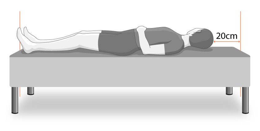 As a rule of thumb, your bed length should be at least 20 cm longer than you are tall Illustration of bed length with man lying on a bed